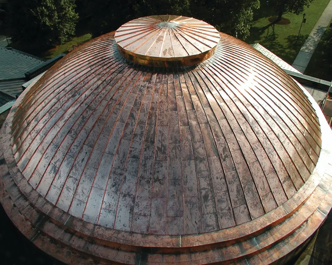 Craftsman Roofing crew installing a new roof in De La Plaine Manor