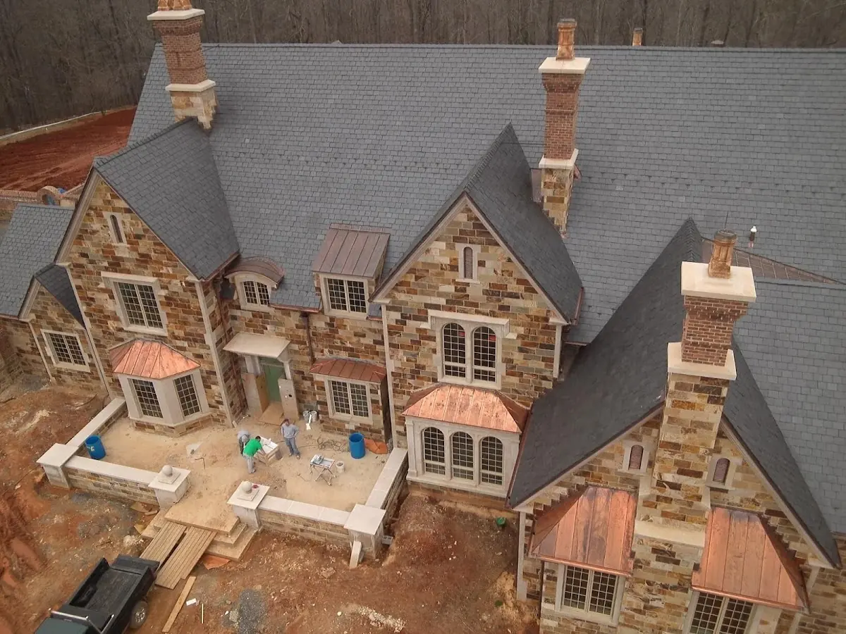 Craftsman Roofing Slate Roof Repair project in De La Plaine Manor